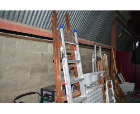 A wooden step ladder together with an aluminium step ladder