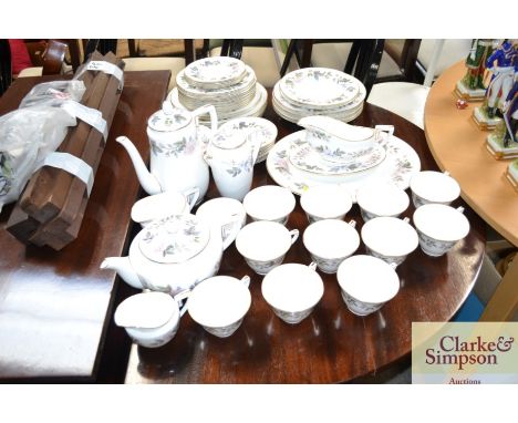 A Royal Worcester "June Garland" decorated tea/dinner service