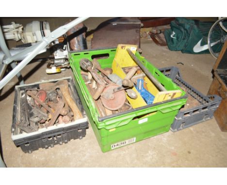 A plastic container of tools and tool heads