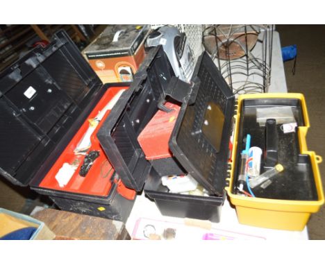 Four plastic tool boxes and contents