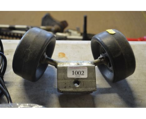 A set of three boat rollers and a twin cranked roller assembly for a boat