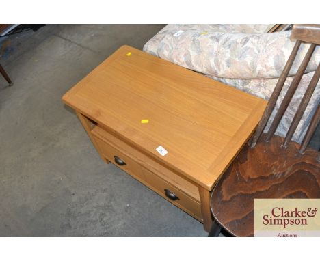 A light oak television stand