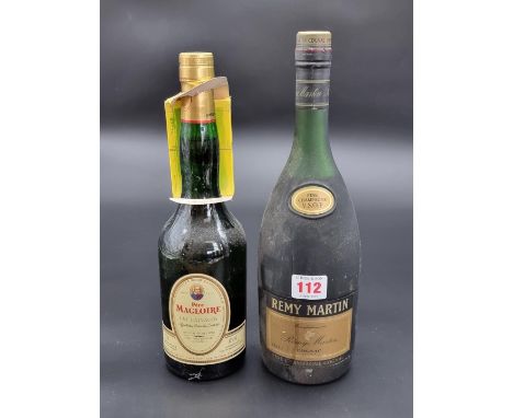 A 1 litre bottle of Remy Martin VSOP Cognac; together with a 70cl bottle of Pere Magloire Fine Calvados. (2) 