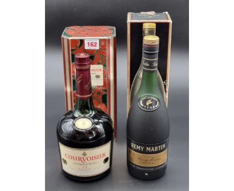 A 1 litre bottle of Courvosier Vs Cognac;&nbsp;together with a 70cl bottle of Remy Martin VSOP cognac, each in card tube. (2)