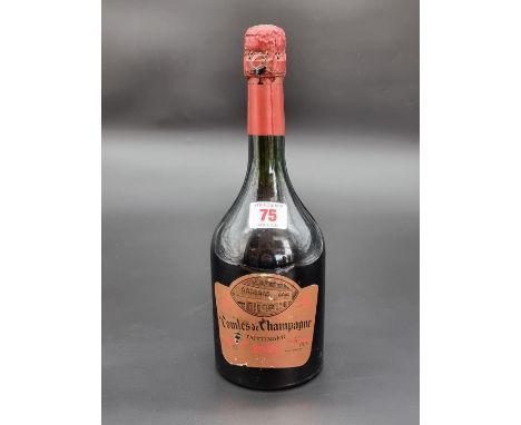 A 75cl bottle of Taittinger 1975 Vintage Rose 'Comtes de Champagne'. 