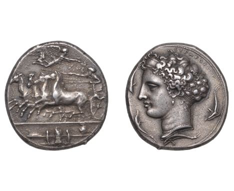 Greek Coinages, Syracuse: Dekadrachm, struck under the tyrant Dionysios I, c. 400-395; school of Kimon  Obverse: charioteer d
