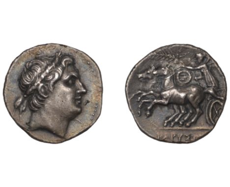 Greek Coinages, Karystos: Didrachm, struck c. 253-245  Obverse: male head right with sharp features, wearing laurel wreath wi