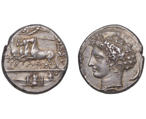 Greek Coinages, Syracuse: Dekadrachm, struck under the tyrant Dionysios I, c. 400-395; signed work of Kimon  Obverse: chariot