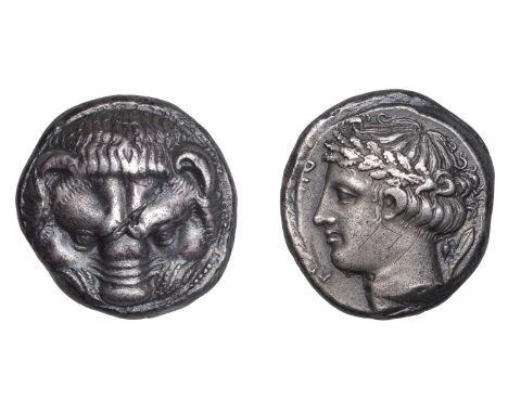Greek Coinages, Rhegium: Tetradrachm, struck c. 415-387  Obverse: lion’s head facing  Reverse: ρηγ[ινον]: laureate head of Ap