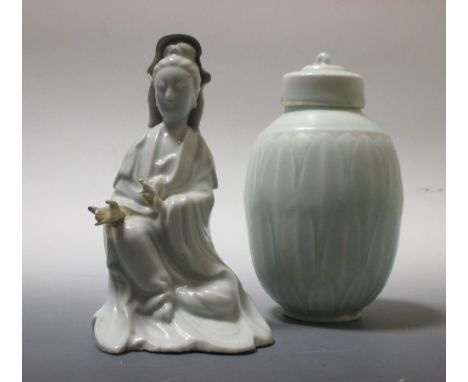 A blanc de Chine Guanyin, 15,5cm high, a provincial Ming blue and white vase and a yingching tea caddy and cover, 15.5cm high