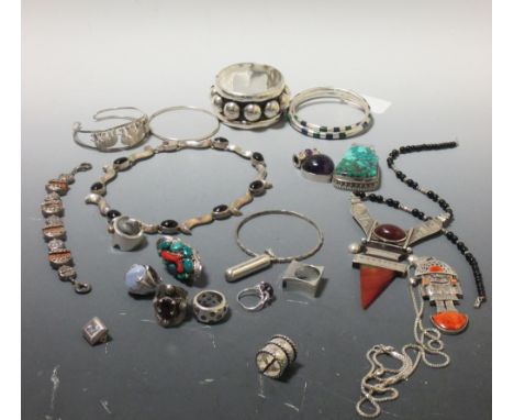 A quantity of silver and gemset jewellery to include bangles, rings and necklaces variously set with turquoise, lapis, amethy
