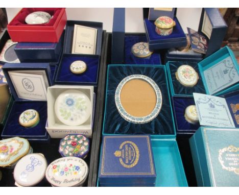 A collection of Halcyon Days and other enamel and ceramic boxes