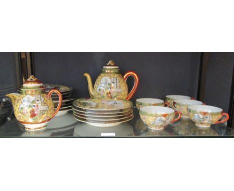 A Japanese eggshell tea set, (two shelves)  