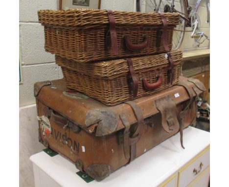 Two mirrors and two picnic baskets and a leather travelling trunk  