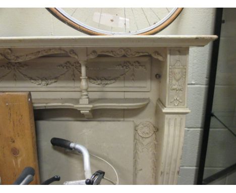 An Edwardian carved wood fire surround, 136cm high x 156cm wide  