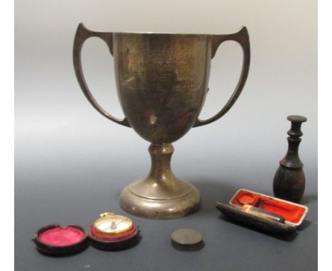 A Morocco leather cased brass travelling compass, a silver trophy cup, two seals and a pill box  