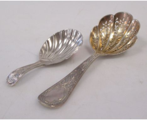 A Victorian silver caddy spoon, 1861 and a Victorian silver sifter spoon by George Fox, 1872  
