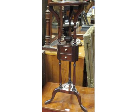 A mahogany wig stand, with small drawers on a tripod base, 87 (h) cm  