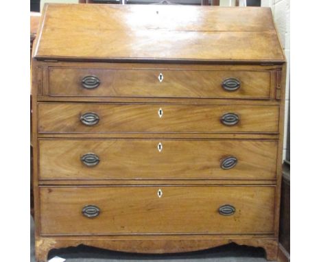 A George IV mahogany bureau, the fall inlaid with a conch shell above four long drawers, on bracket feet, 110 (h) x 102 (w) c