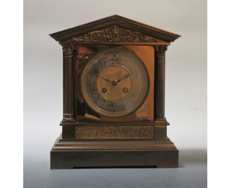 A 19th century French brass mantel clock, of classical form case and gong striking movement, 31cm high  lacquer finish rather