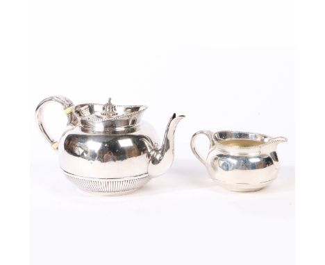 London, the milk jug 1871, the teapot 1873, maker George Fox, retailed by Tessier, with beaded rims and acanthus leaf capped 