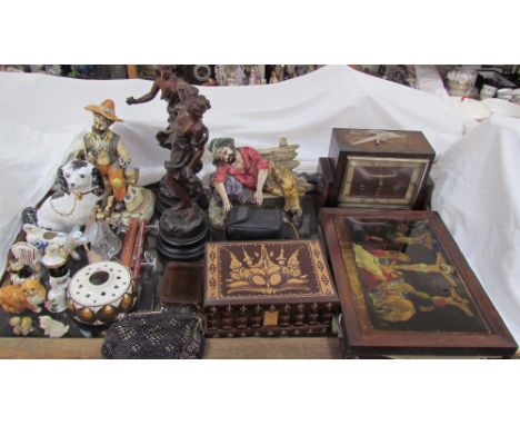 A pair of religious reverse painted prints together with a mantle clock, spelter figures, box and cover, pottery figures, pur