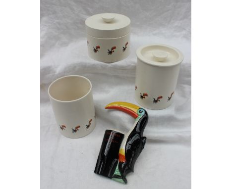 A set of three Carltonware Guiness storage jars together with a Toucan "Guinness for strength" plaque 18cm high 