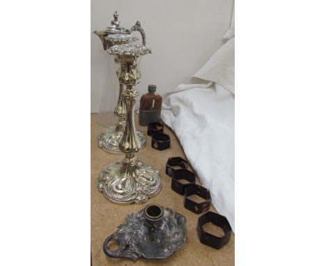 A WMF Art Nouveau chamber stick together with electroplated candlesticks, claret jug, hip flask and napkin rings