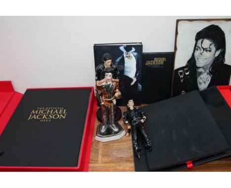 The official Michael Jackson Opus together with other books on Michael Jackson, figures etc