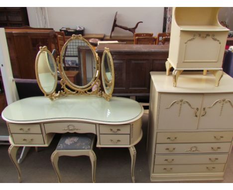 A 20th century cream and gilt decorated dressing table with matching stool, bedside cabinet and side cabinet