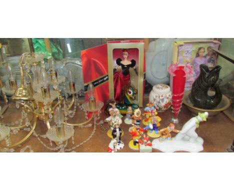 Eleven Royal Doulton figures including Tino the Trixter,Randolf the Ring Master, Bunnykins etc, together with two boxed Barbi