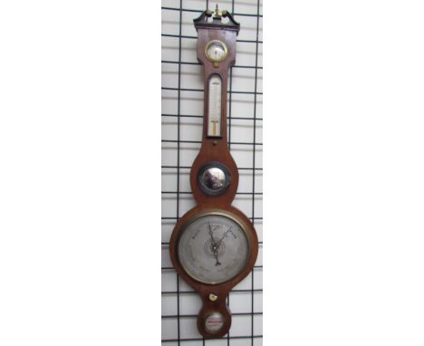 A 19th century mahogany banjo barometer with a hygrometer, alcohol thermometer, convex mirror, silver dial and spirit level