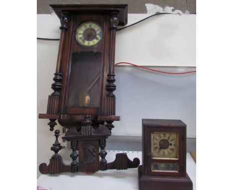 A Vienna regulator type wall clock together with a mantle clock