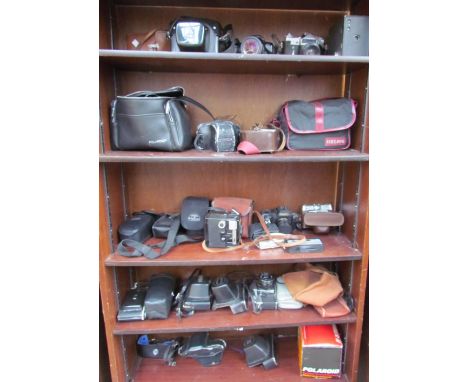 A Practica 35mm camera, together with other cameras etc