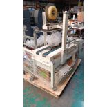 Endoline 710 semi-automatic case sealer, serial number 97046810, with concertina conveyor section