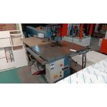 Notting long arm drill press on steel bench, serial number 928