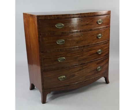 An early 19th century mahogany bow front chest, of four long graduated drawers, on splayed bracket feet, W.3ft 3in.