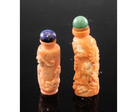 Two Chinese coral snuff bottles, late 19th / early 20th century, the first carved in relief with dahlias, 5.5cm the second wi
