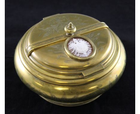 A 19th century cameo inset brass table snuff box, with remains of gilding and a cameo bearing the arms of the Habsburg Royal 