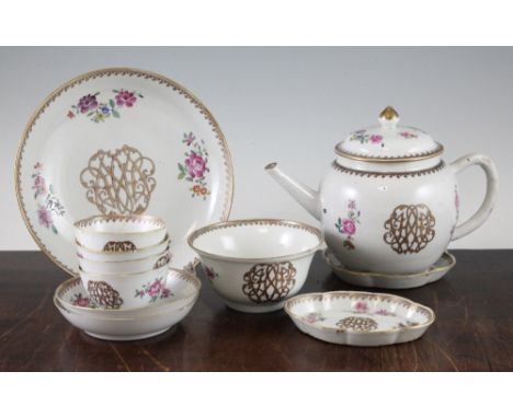 A Chinese Export famille rose part tea service, c.1770, each piece gilt decorated with the cypher HHM or W, and flower sprays