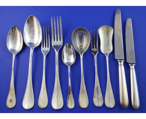 A 19th century French 950 standard silver canteen of flatware for twenty four, with engraved monogram, comprising table and d