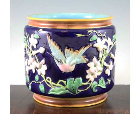 A George Jones majolica Humming Bird and Stephanotis pattern circular jardiniere, late 19th century, relief moulded with the 