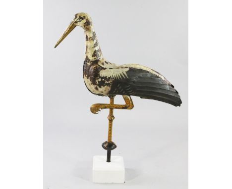 A 20th century Toleware weather vane, modelled as a stork standing on one leg, possibly French, 32in.