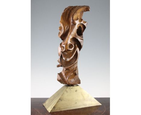 A 20th century carved oak abstract sculpture, depicting a smiling face, marked and dated with the initials SD 41, on a lacque
