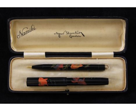 An Alfred Dunhill Namiki lacquered lady's writing set, including a small fountain pen with a no.2 nib and matching pencil, bo