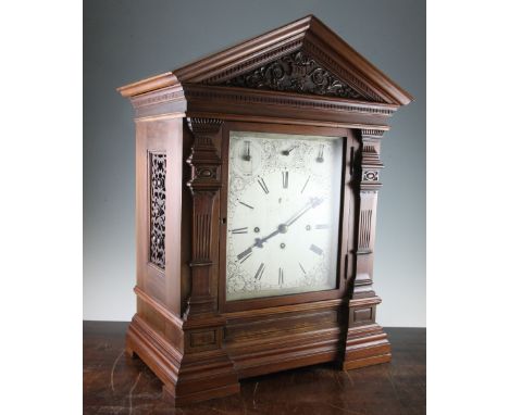An Edwardian walnut chiming bracket clock, with architectural case and silvered dial with eight bells / Westminster selector,