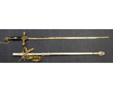 An early 20th century American Masonic Knights Templar dress sword, with knight head pommel, oval enamelled guard, the etched