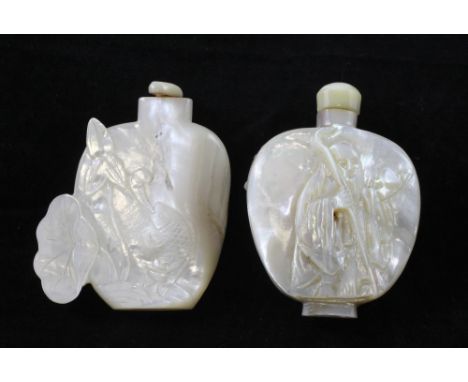 Two Chinese mother-of-pearl snuff bottles, 1800-1900, the first of spade form carved in high relief with the figure of Shou L