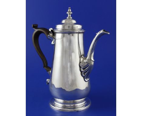 A George II silver coffee pot, of tapering cylindrical form, with turned finial and wooden scroll handle, IC?, London, 1749, 
