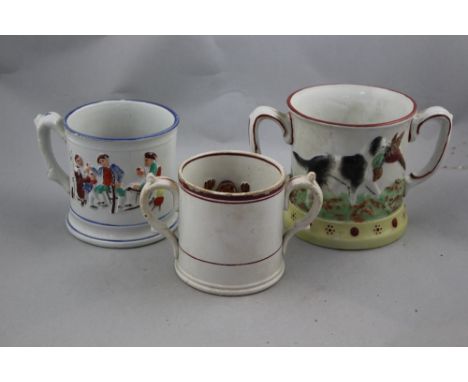Three Staffordshire pottery 'frog' mugs, late 19th century, the first two handled and moulded with dogs and pheasants, 14cm, 